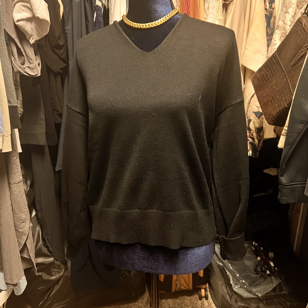 Woman’s size M (6) open shoulders and back
